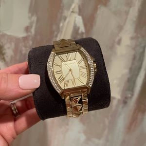 Vince Camuto gold rhinestone pyramid watch with Roman numerals